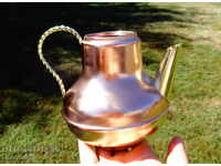 Honey and brass jug.