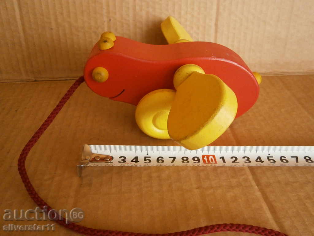 Auction retro wooden toy on wheels Auction retro wooden toy on wheels