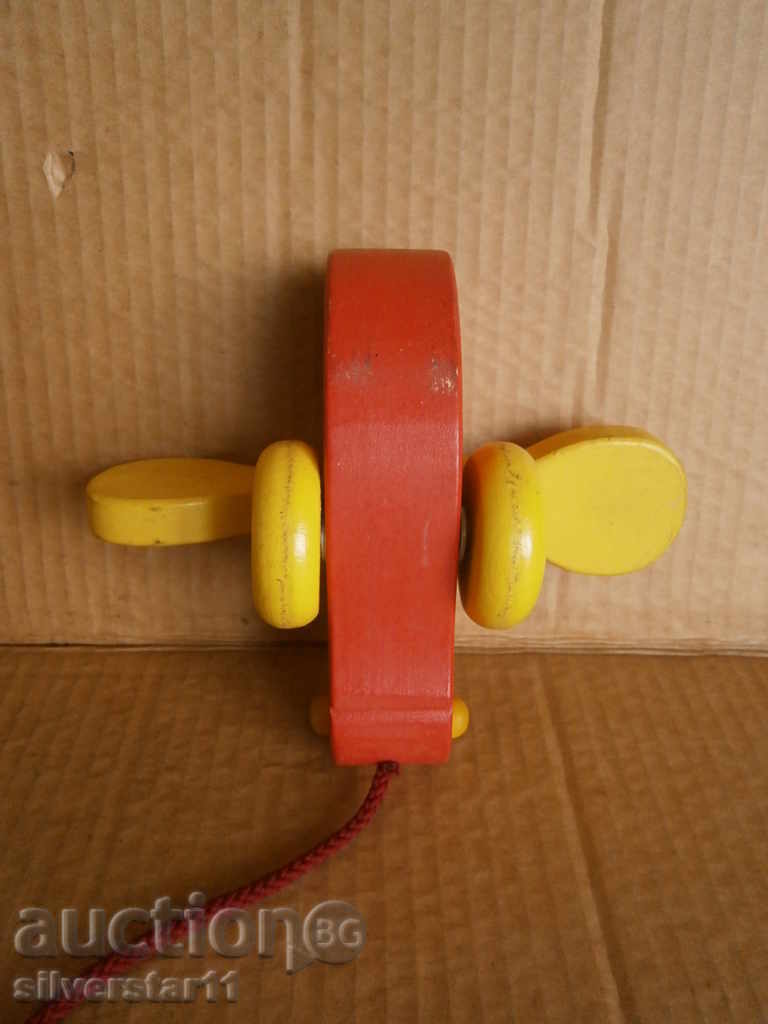 Delivery of retro wooden toy on wheels Delivery of retro wooden toy on wheels