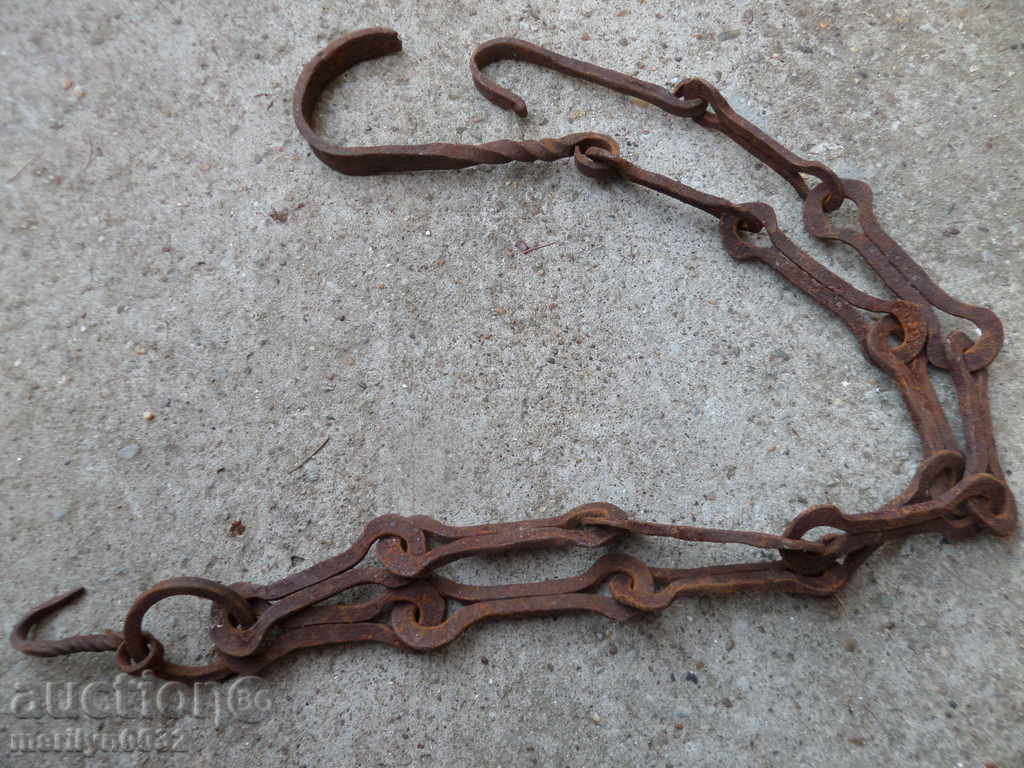 Auction  Old forged chain with hook, hearth for hearth