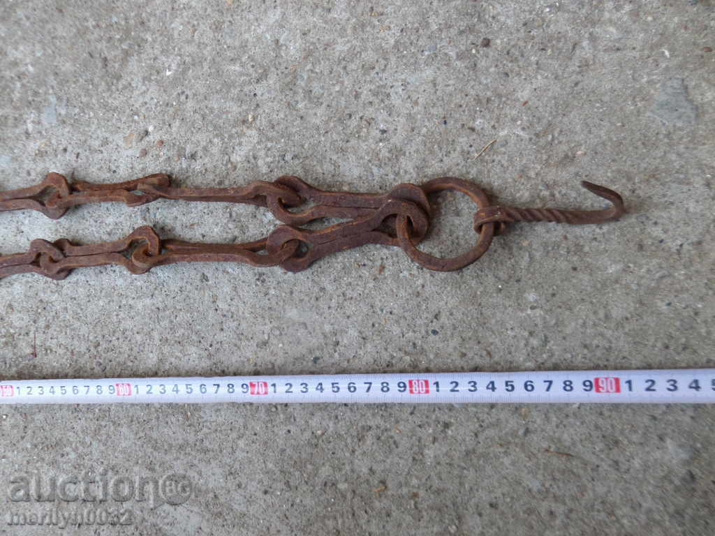 Delivery of Old forged chain with hook, hearth for hearth