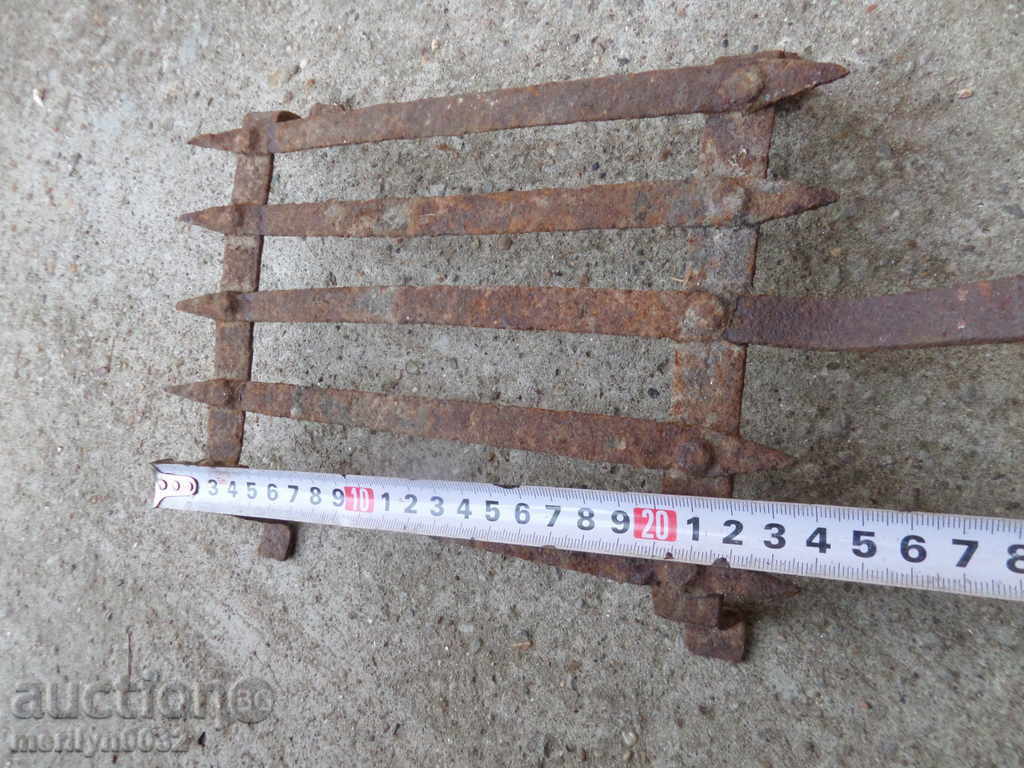 Auction An old hand-forged grill, a steak, wrought iron Auction An old hand-forged grill, a steak, wrought iron