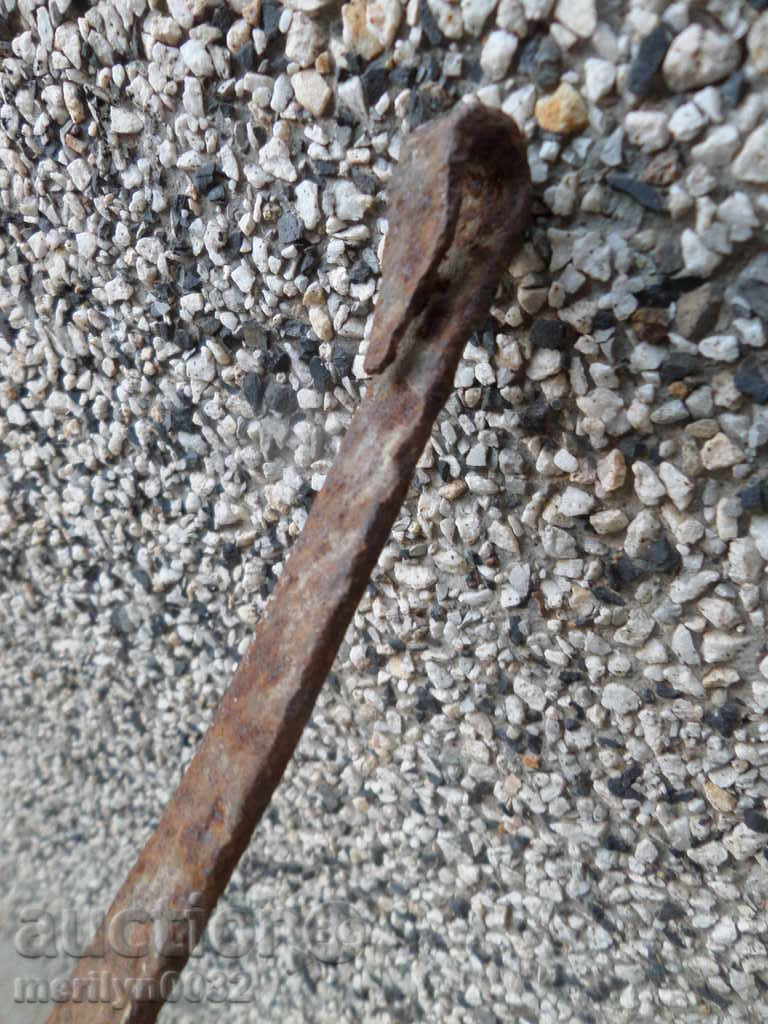 Delivery of An old hand-forged grill, a steak, wrought iron Delivery of An old hand-forged grill, a steak, wrought iron