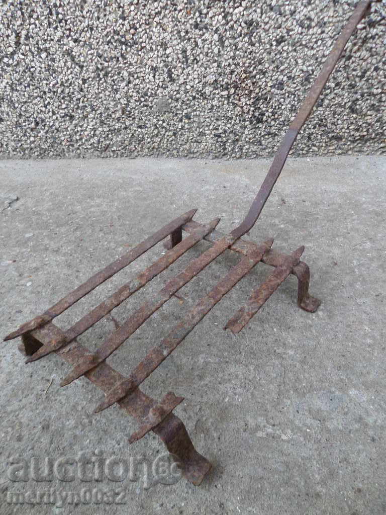 An old hand-forged grill, a steak, wrought iron - 5 An old hand-forged grill, a steak, wrought iron - 5