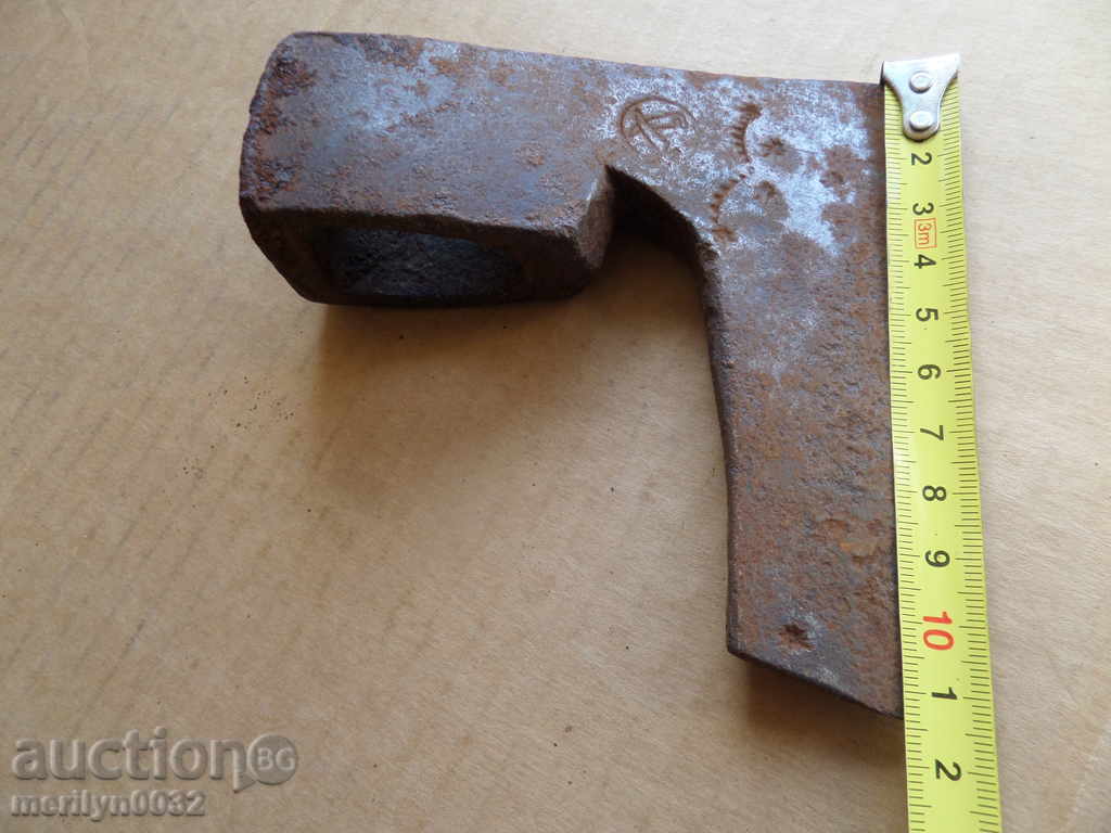 An old ax with a marker saber hat punch - 6 An old ax with a marker saber hat punch - 6