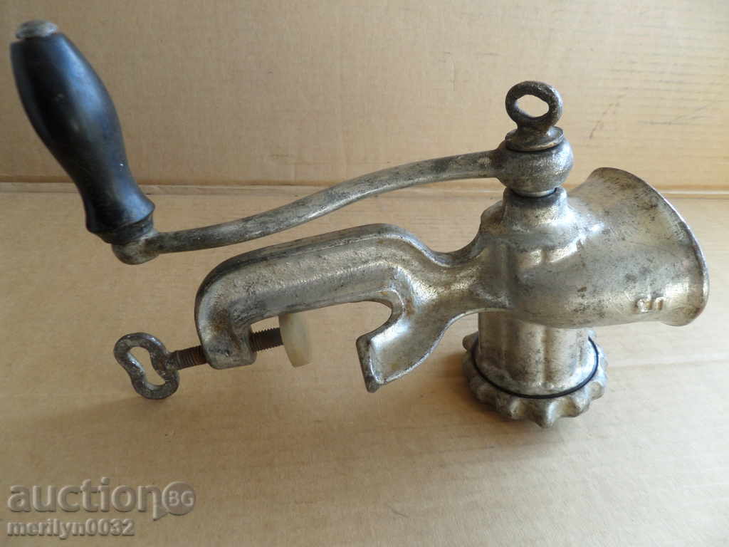 Auction An old metal grinder for meat grinders Auction An old metal grinder for meat grinders
