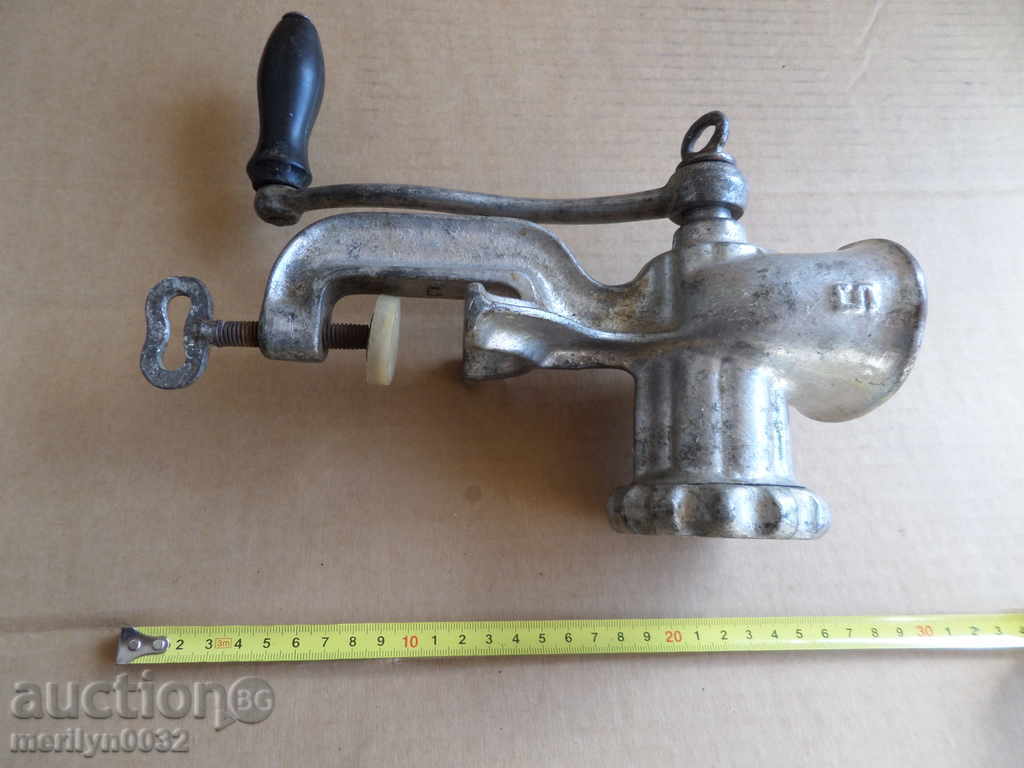 Delivery of An old metal grinder for meat grinders Delivery of An old metal grinder for meat grinders