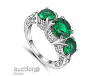 Ring with emerald and zircons, size 52