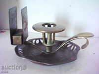 Old candlestick with match holder