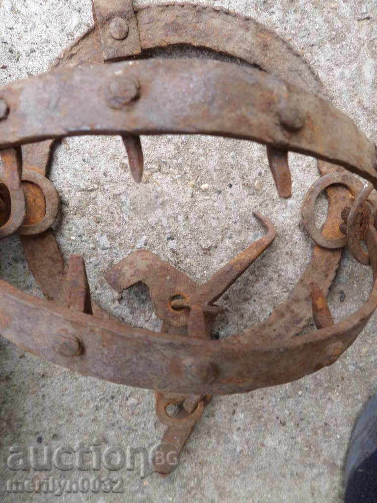 Auction Old hand forged trap with wrought iron spikes Auction Old hand forged trap with wrought iron spikes