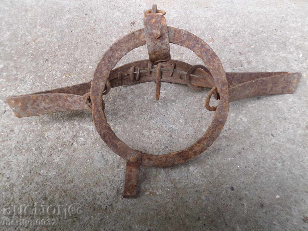 Delivery of Old hand forged trap with wrought iron spikes Delivery of Old hand forged trap with wrought iron spikes