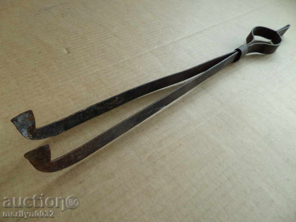 Old hand-forged dilaf, wrought iron, tongs