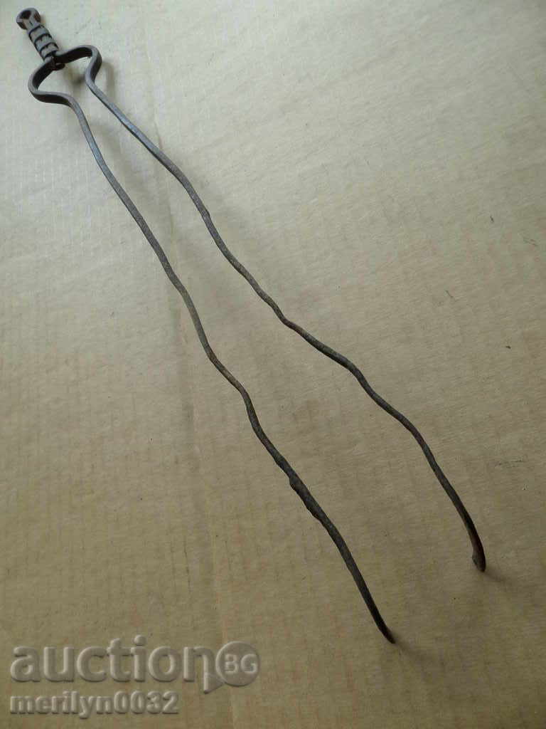 Delivery of Old hand forged dilaf, wrought iron, mask Delivery of Old hand forged dilaf, wrought iron, mask