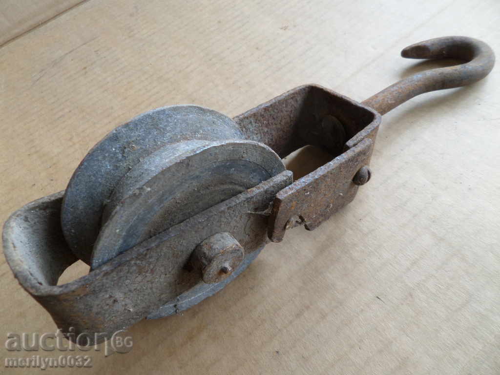 Delivery of Old forged roller polisher wrought iron pulley reel