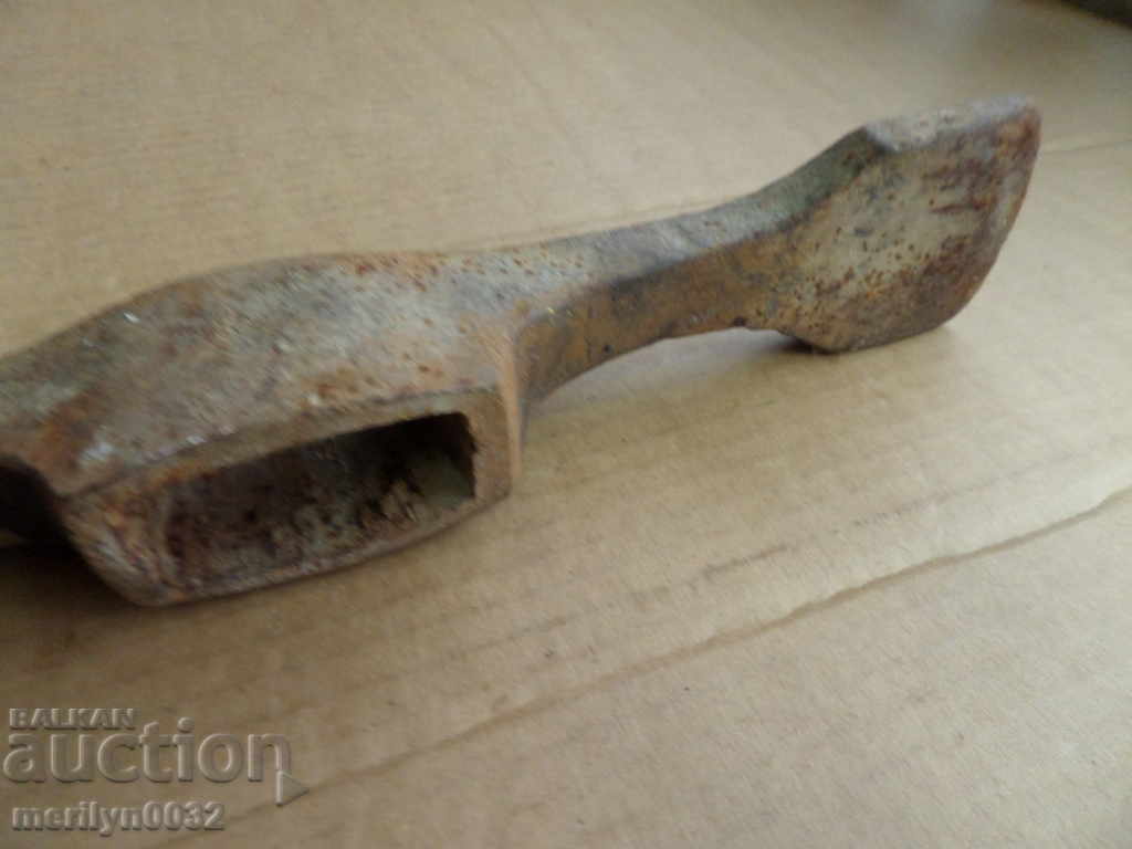 Delivery of An old hand-forged tool forged wrought iron Delivery of An old hand-forged tool forged wrought iron