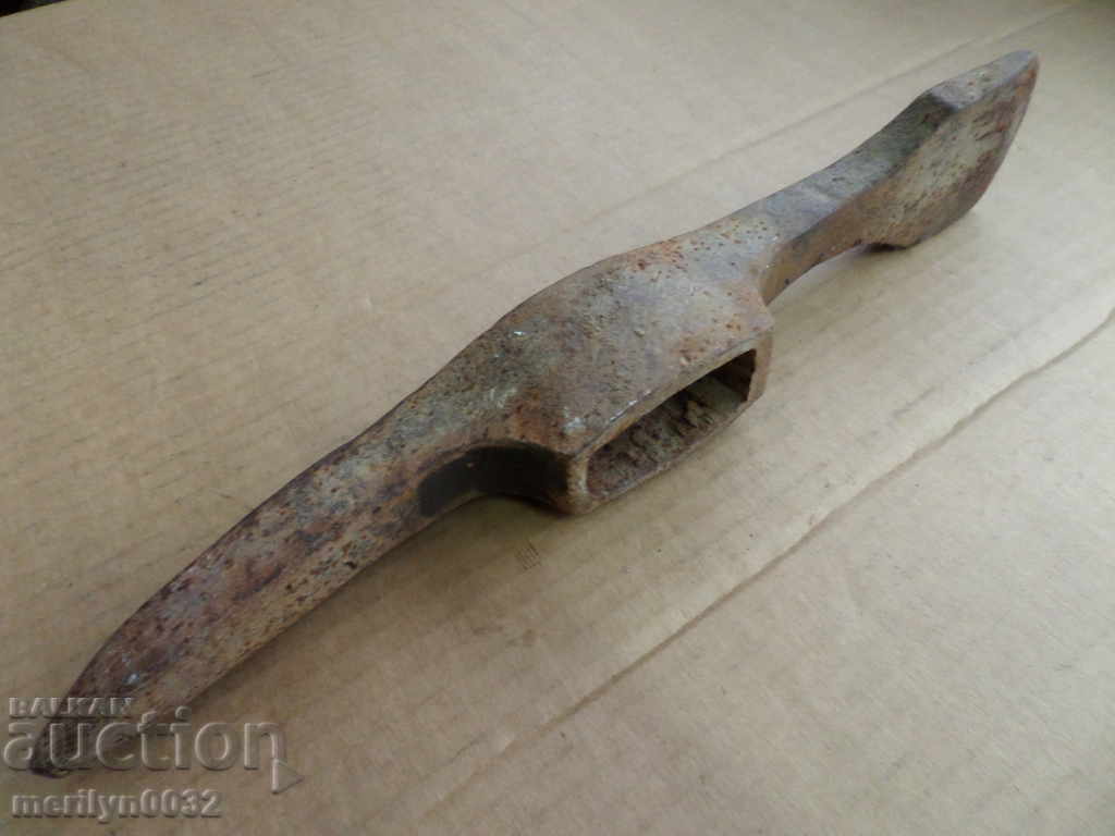 An old hand-forged tool forged wrought iron