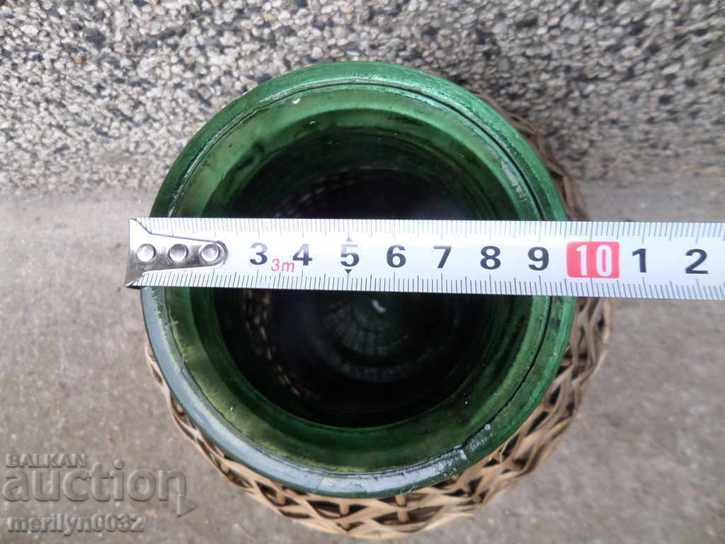 Delivery of Old jar jar with a stones wicker bottle