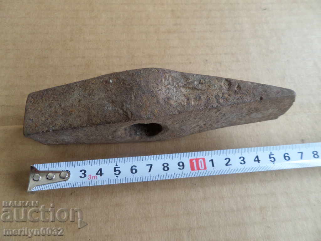 Delivery of An old stone hammer, a tool, a kink Delivery of An old stone hammer, a tool, a kink