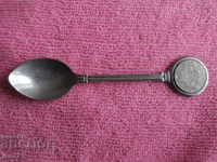 An ancient silver silver scoop