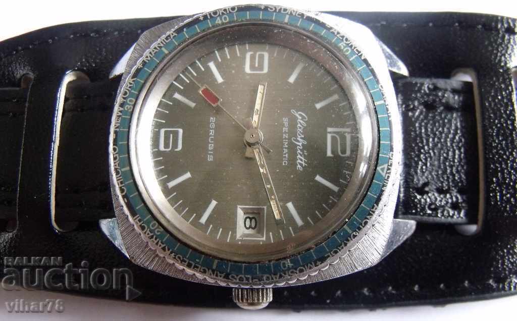 Auction  RUBY GUB-GLASHUTTE MALE CLOTHING CLUTCH WITH WORLD TIME