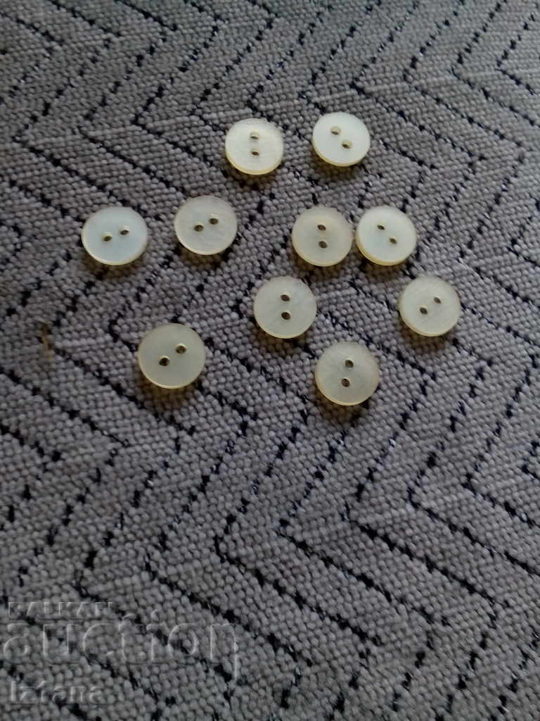 Auction  An old button, buttons