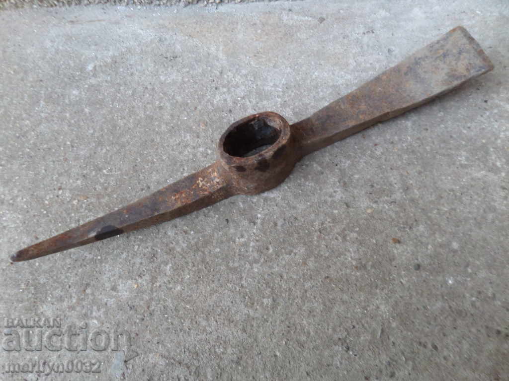 Auction  Old forged saw, wrought iron, instrument