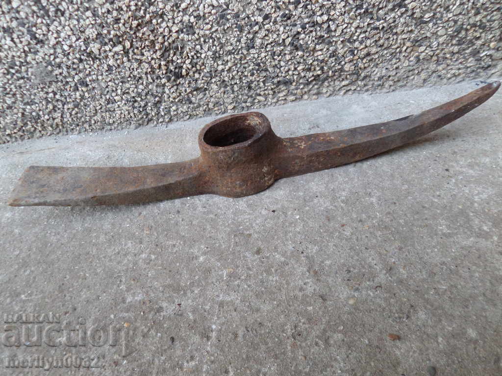 Old forged saw, wrought iron, instrument