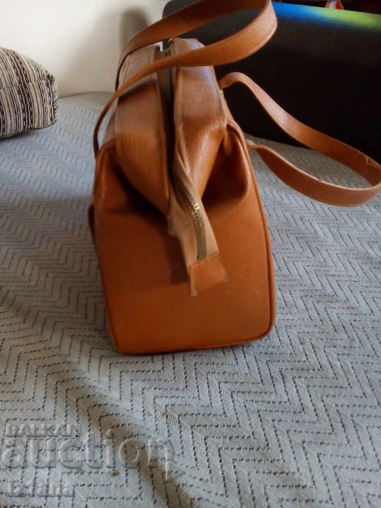 Delivery of An old leather luggage bag Delivery of An old leather luggage bag