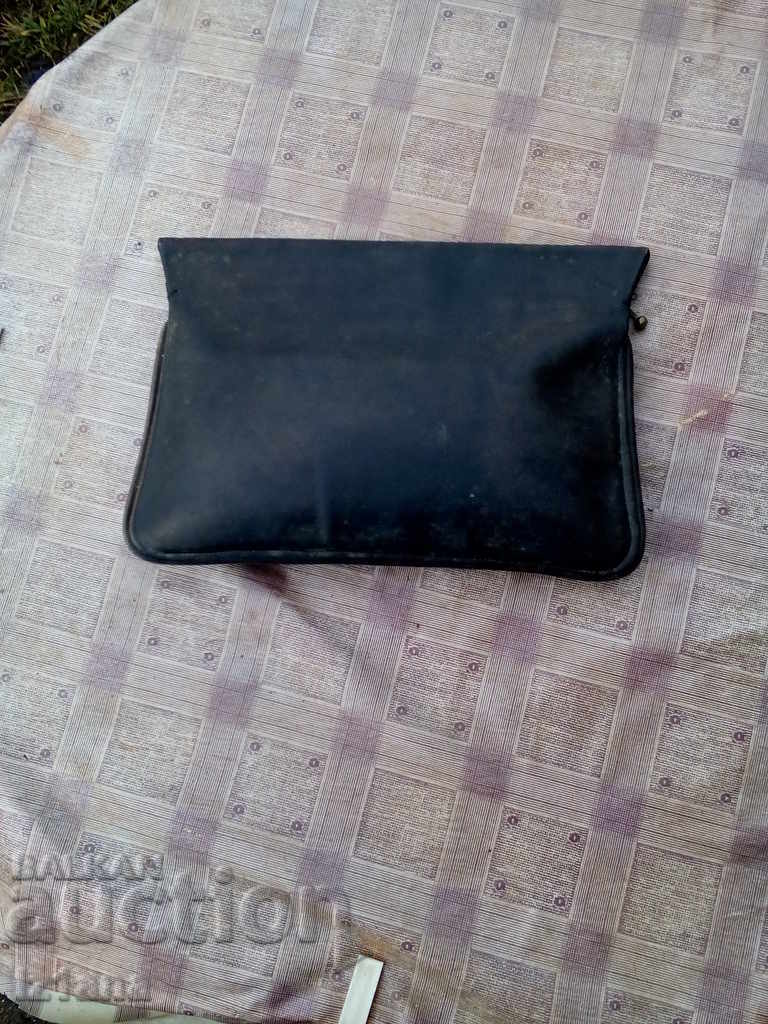 An old leather purse, a nurse