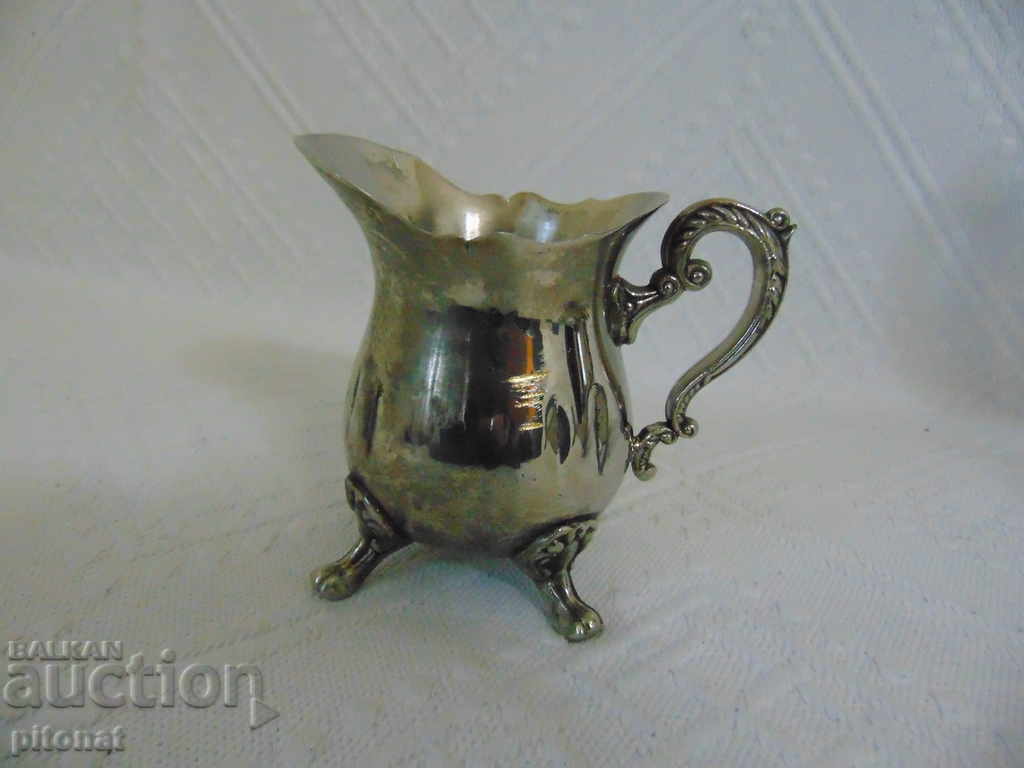 Auction  Exquisite metal service for tea, coffee