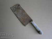 A hand forged ax, a pole, a chopper, a wrought iron, a primitive