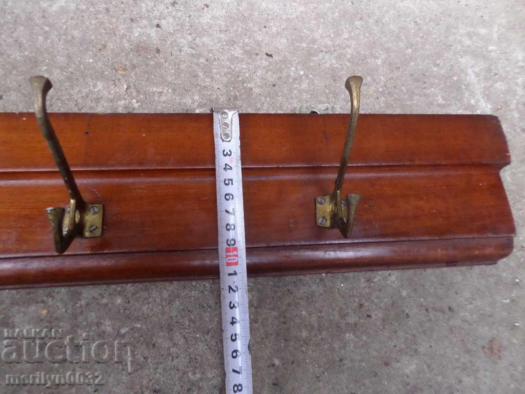 Auction  An old bourgeois coat of walnut forged wrought iron