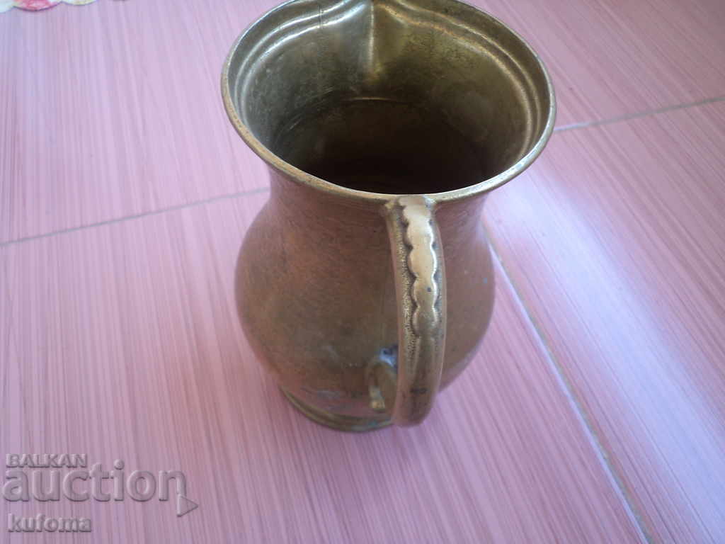Auction  Bronze jug 19 cm