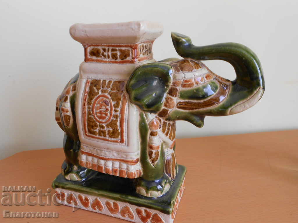 Porcelain elephant with price 50.00 BGN | € 25.56 Porcelain elephant with price 50.00 BGN | € 25.56