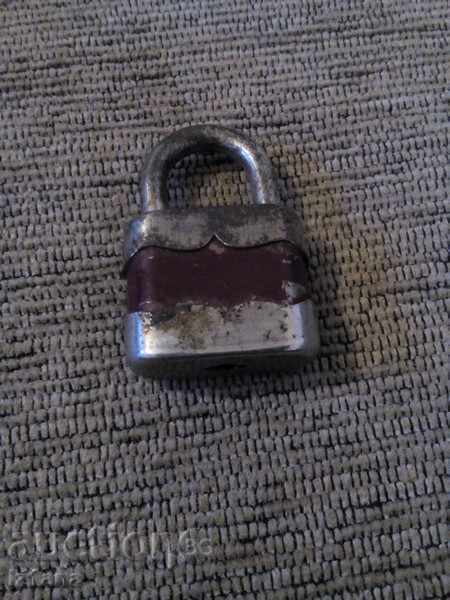 Old padlock with price 1.00 BGN | € 0.51 Old padlock with price 1.00 BGN | € 0.51