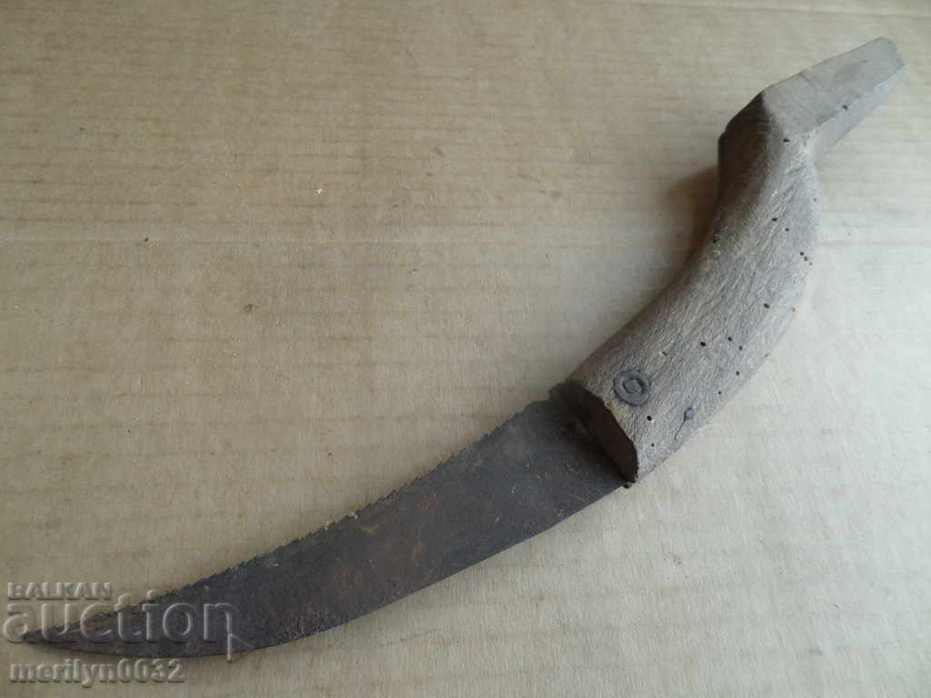 Delivery of An old knife with wood shavings, a knife, a dagger, a blade Delivery of An old knife with wood shavings, a knife, a dagger, a blade