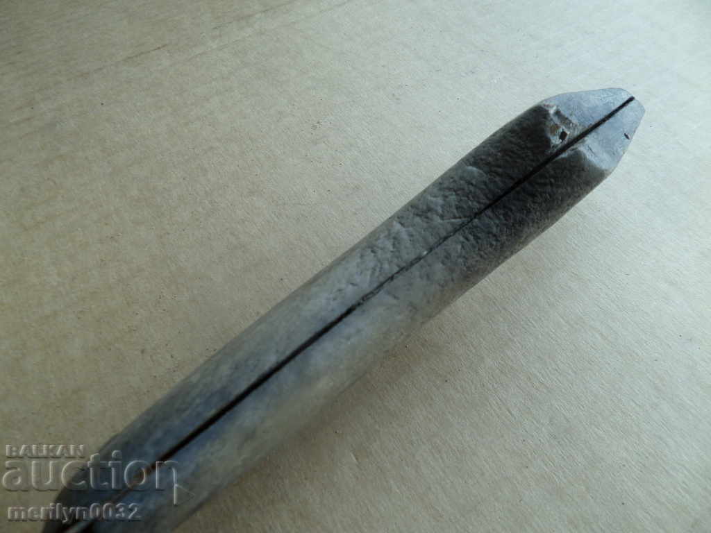 Delivery of An old knife with wood shavings, a knife, a dagger, a blade Delivery of An old knife with wood shavings, a knife, a dagger, a blade