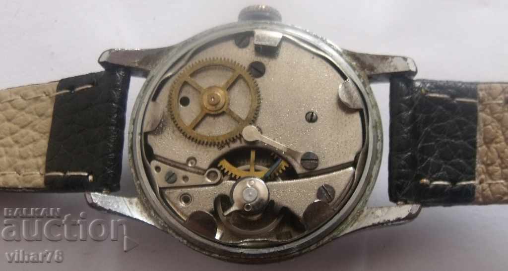 Auction  ROUND-MEN'S CLOCK