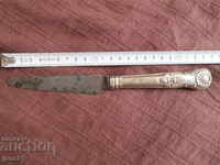 Very old English knife with a silver-plated handle