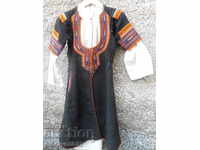 Old embroidered sukman with a costume shirt