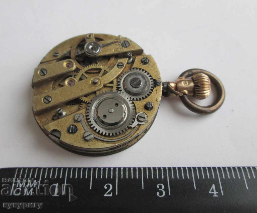 An old lady's gold pocket watch machine - 7 An old lady's gold pocket watch machine - 7