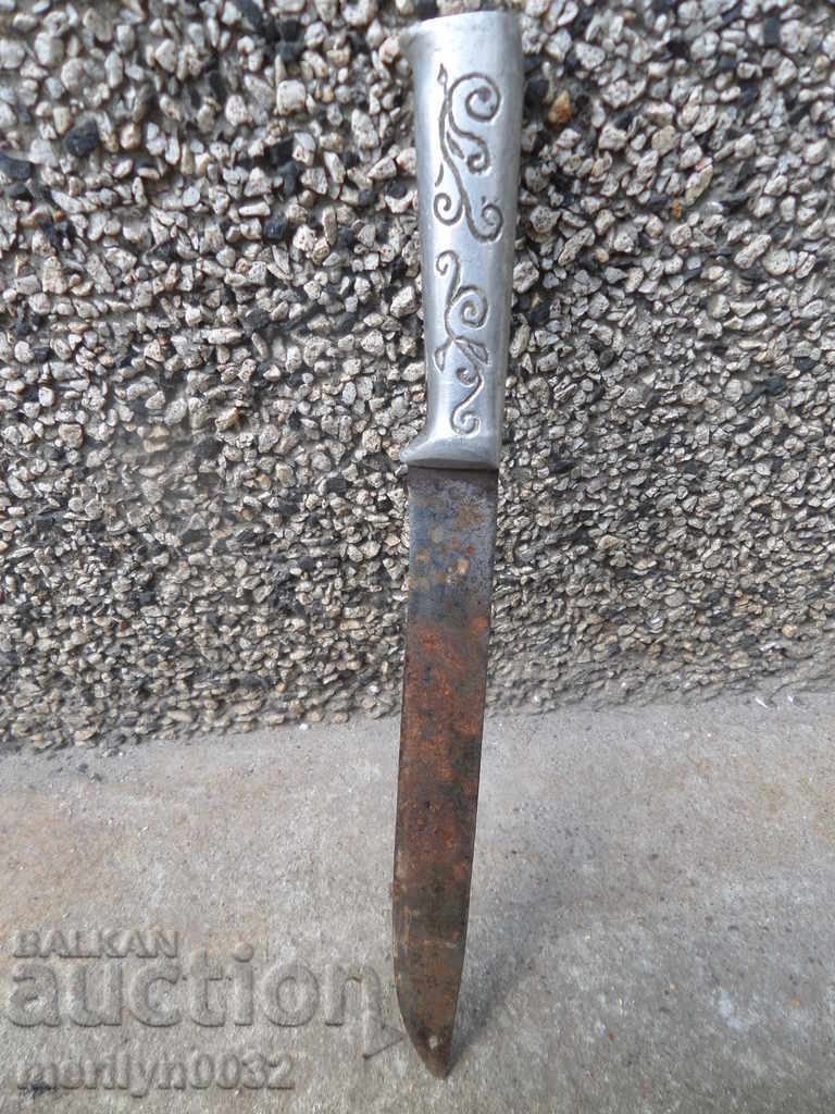 Old butcher knife with metal engraved scraps of karaoke dagger