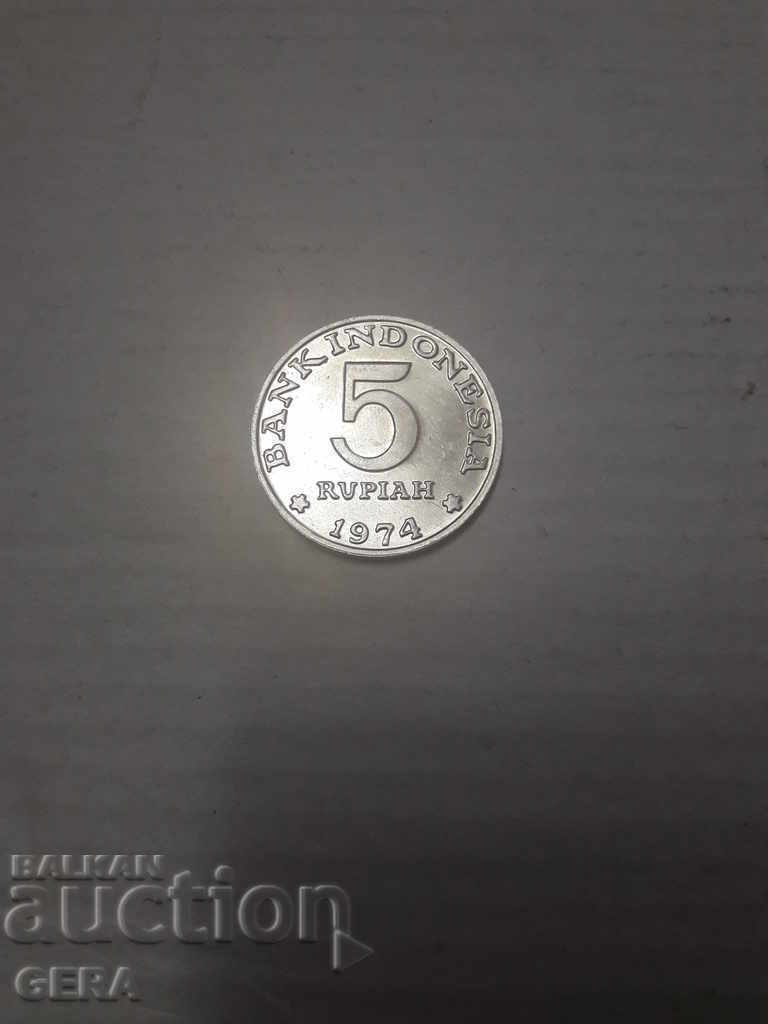 монета 100 рупии Индонезия