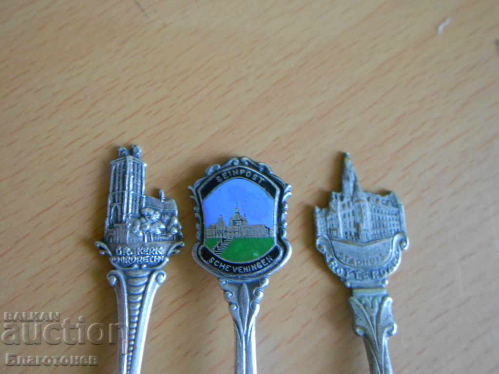 Colored collector spoons - 7 Colored collector spoons - 7