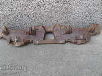 Old antique hanger with a woodcarving primitive