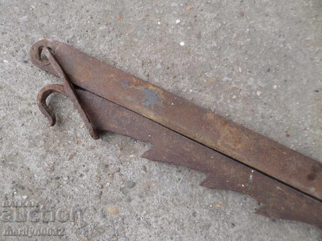 Auction  Old forged brace for hearth iron forged iron
