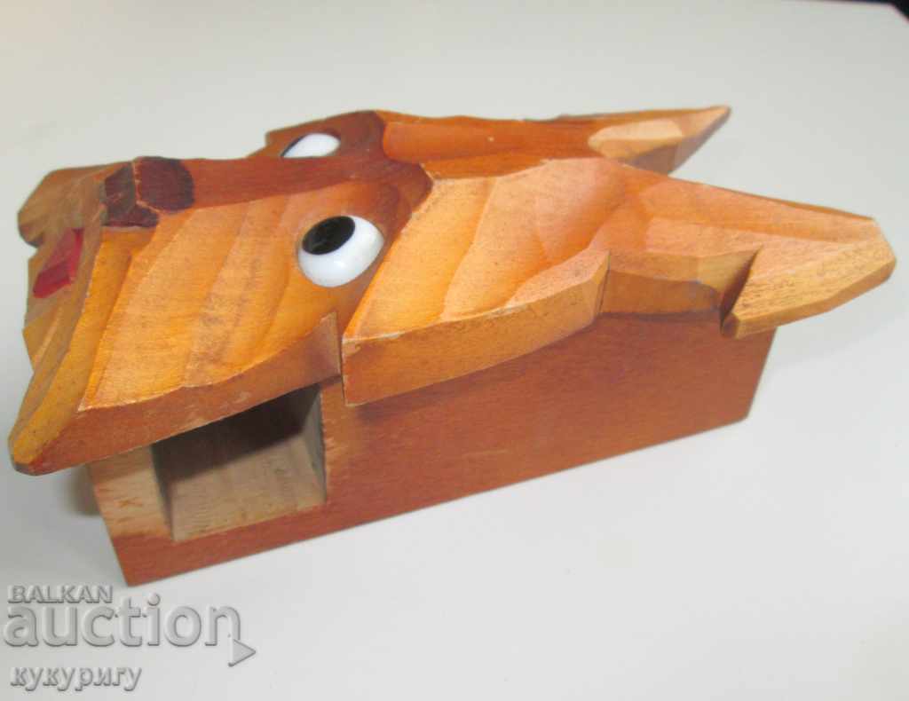 An old wooden carving dog with a glass eye wall mount with price 40.00 BGN | € 20.45