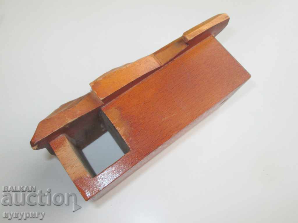 Auction  An old wooden carving dog with a glass eye wall mount