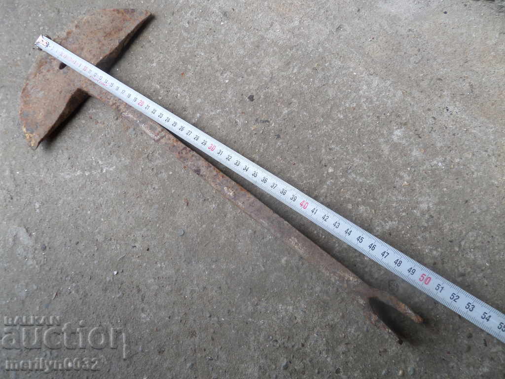 Auction  Hand forged lump from an old plow, wrought iron