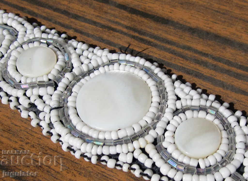 an old antique Bulgarian folklore bracelet of beads and mother of pearl with price 20.00 BGN | € 10.23